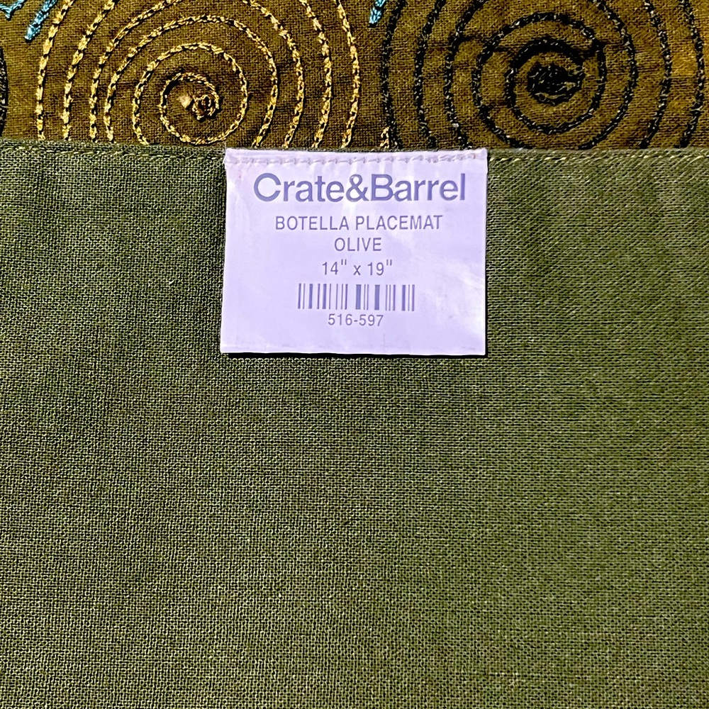 Crate and Barrel placemats. Green circular designs.